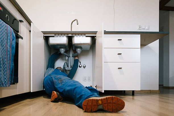 Professional Drain Cleaning technician working in Ore City, TX